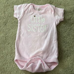 Sara Kety “Little Sister” Onesie